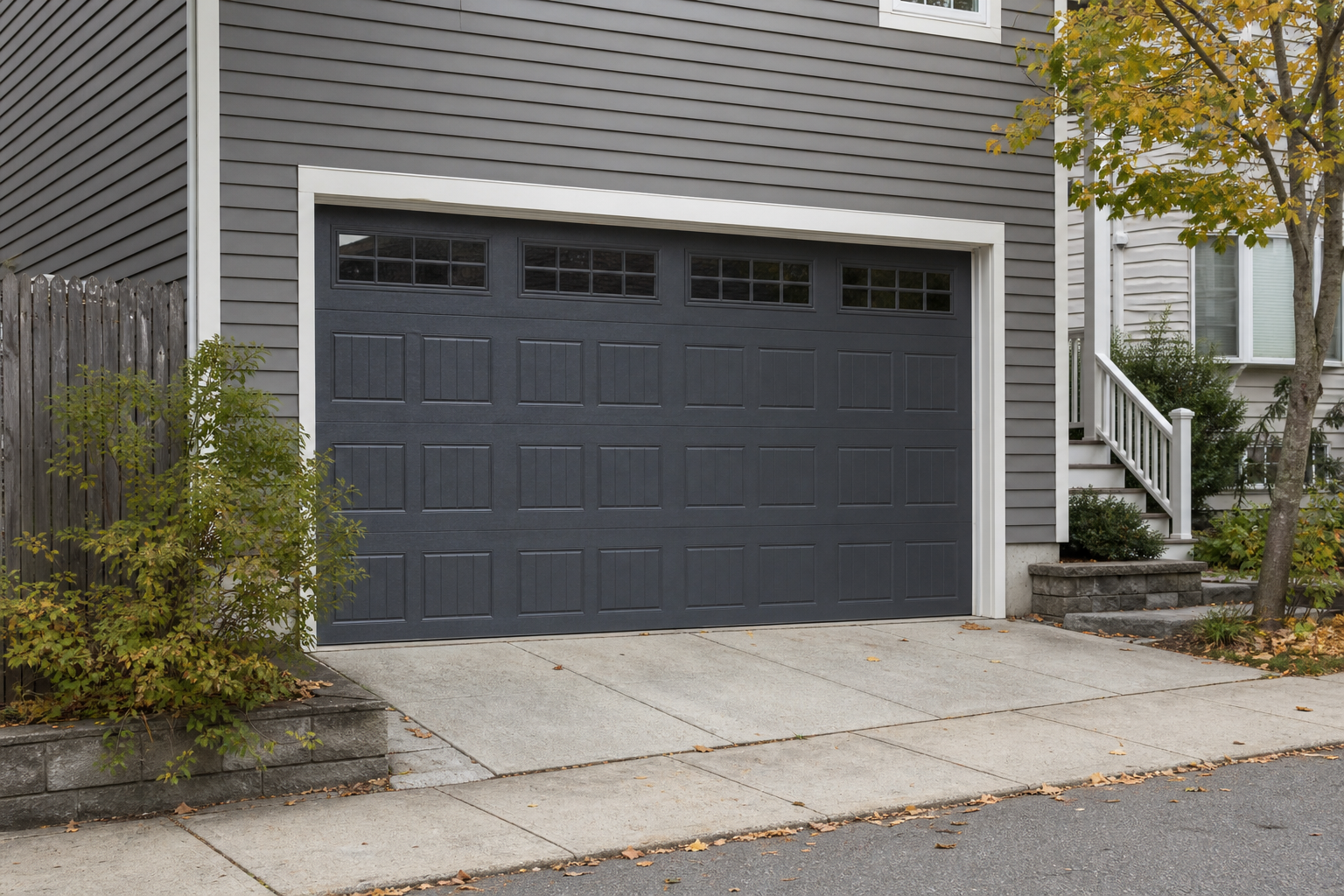 Residential garage door on a Somerville home during fall maintenance